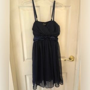 Size L Navy dress from Forever 21
With satin sash and ties in the back